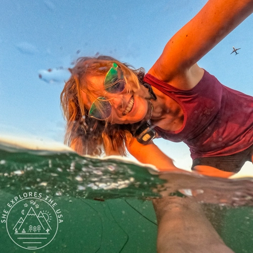 photo taken with the Dome Port for Underwater Photography with a plane photobombing in the background sky