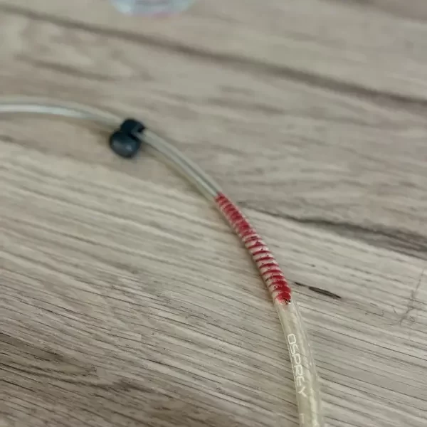 pass the thin brush through the tubes for a thorough clean - How To Clean A Hydration Bladder