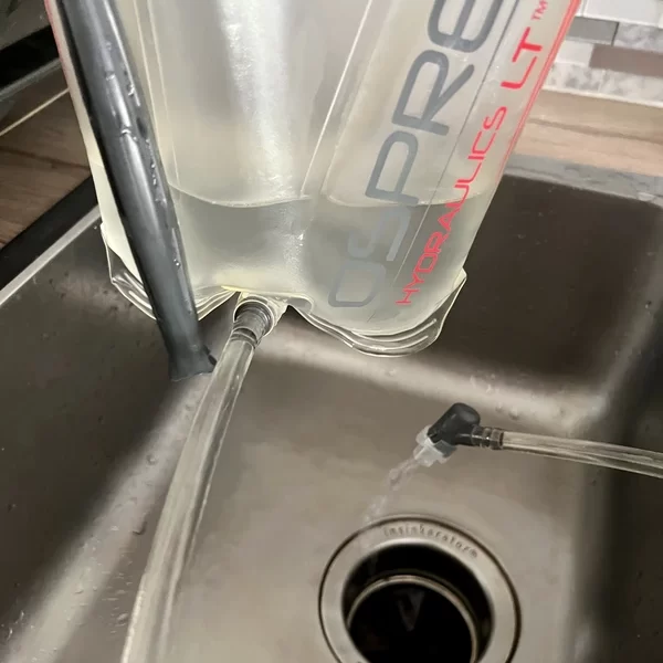 drain the cleaning water through the tubes - How To Clean A Hydration Bladder