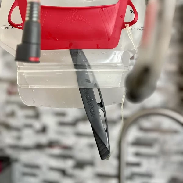 slip the slide-seal through the opening of the bladder - How To Clean A Hydration Bladder