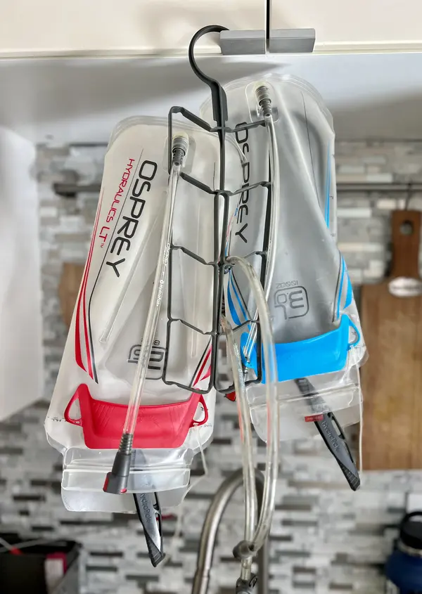 Both my water bladders hang upside down over the kitchen sink - How To Clean A Hydration Bladder