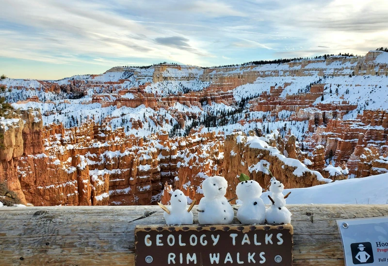 snow covered Bryce Canyon National Park with 4 little snowmen