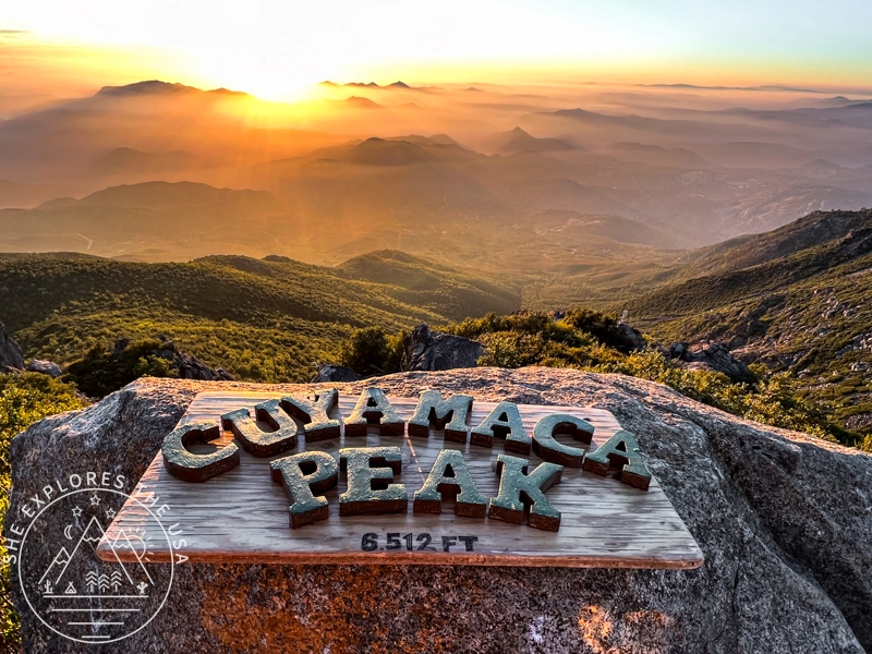 golden hour with the cuyamaca peak sign - view from cuyamaca peak summit near sunset