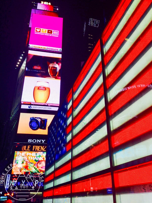 times square and american flag