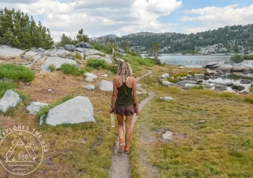 Labor Day Sale 2025 - a female hiker hikes along thousand island lake in the Sierra on labor day weekend