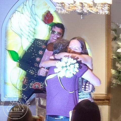 Elvis and a couple at the wedding chapel