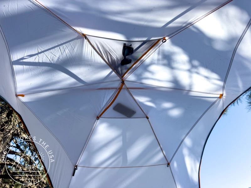 2 Overhead Gear Loft Pockets: One is ripstop, and the other is mesh. You can slide your phone into the mesh one to watch movies from your sleeping bag.