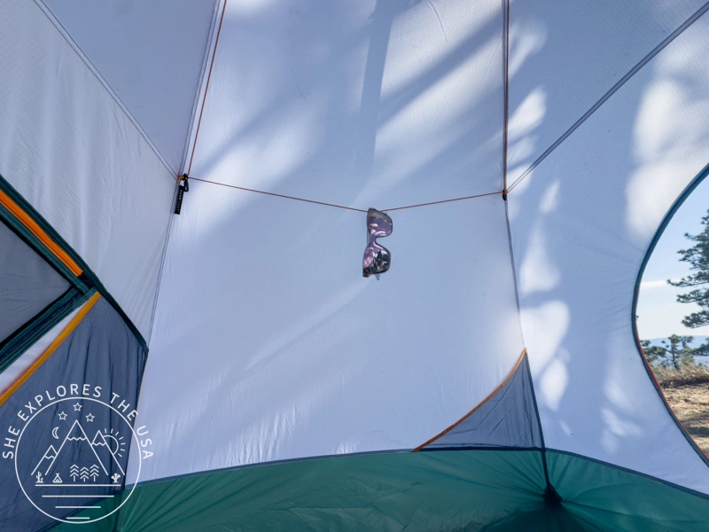 mountain hardwear mineral king all season tent seen from inside with sunglasses hanging from the HangTight™ System rope