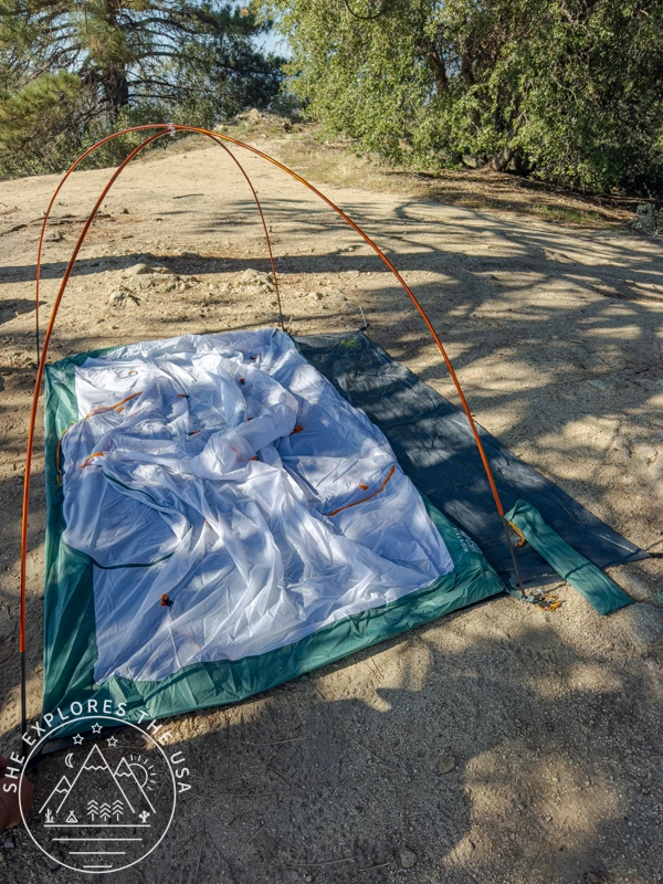 Mineral King All Season tent with canopy laying flat over the footprint with the poles set up in the 4 corners only