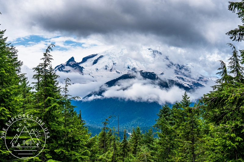 My Mount Rainier National Park Adventure - Mount Rainier peeking from a viewpoint