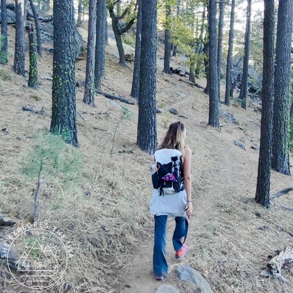 ariel view of a woman hiking using the HoverAir X1 Pro in follow mode