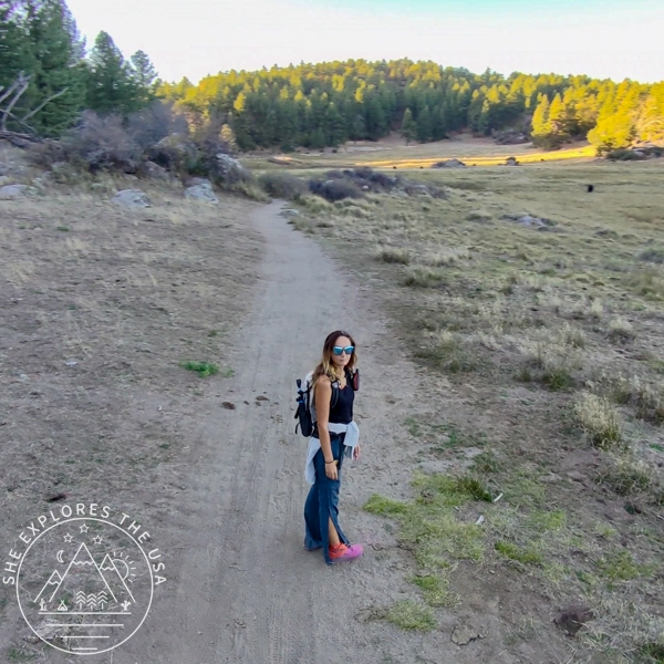 ariel view of a woman hiking using the HoverAir X1 Pro in orbit mode