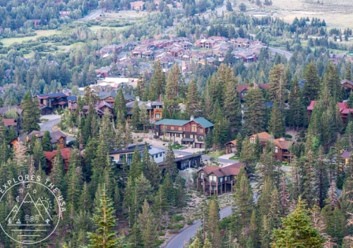 Aerial view of mountain houses and pine trees in Mammoth Lakes California taken from Panorama Dome