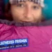 A woman is seen insider her Feathered Friends petrel 10 ul sleeping bag