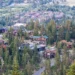 Aerial view of mountain houses and pine trees in Mammoth Lakes California taken from Panorama Dome